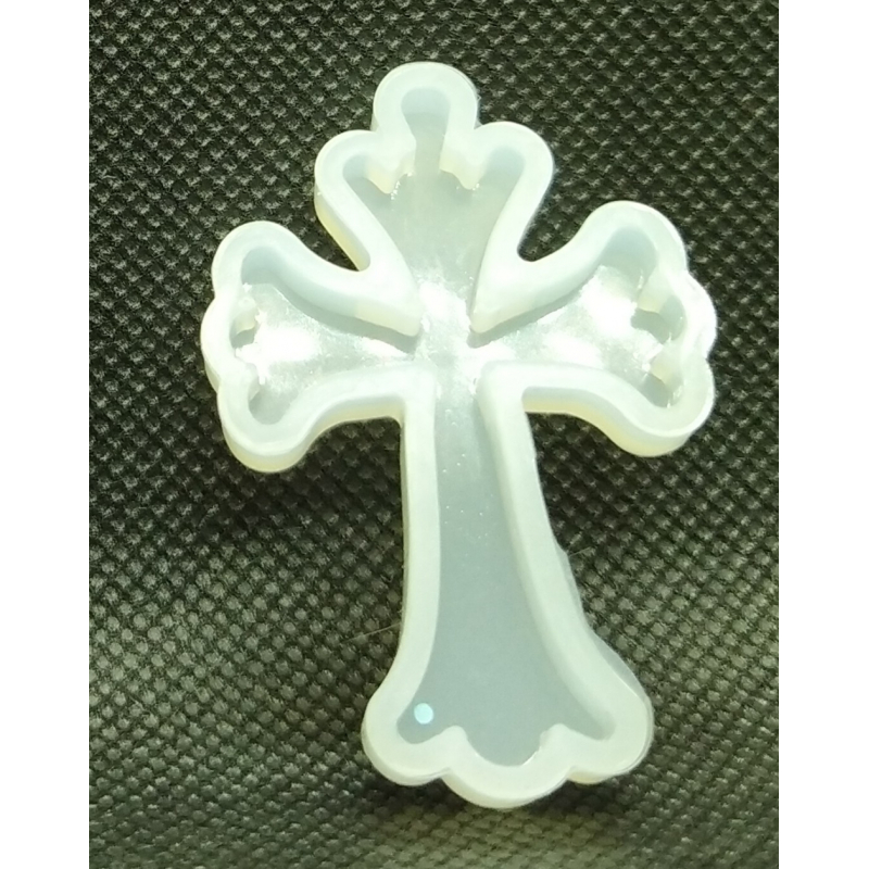 mal kruisje groot 4,5 x 3 cm.