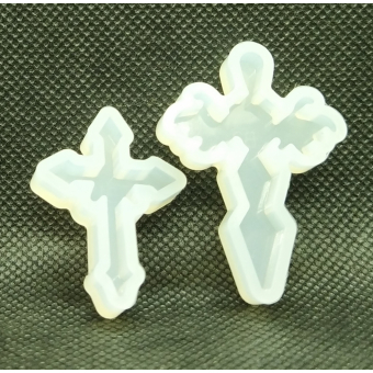 mal kruisje groot 4,5 x 3 cm.