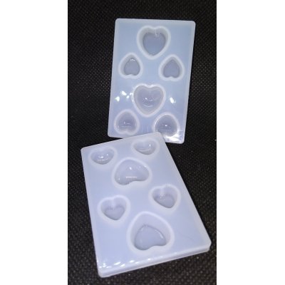 mal setje hartjes hanger en oorbellen