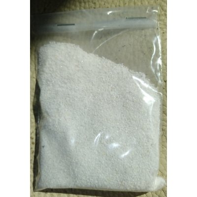 zakje wit grof zand 100gr.