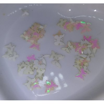 vlindertjes 0,5 cm. wit tintjes vlindertjes 0,5 cm. wit tintjes